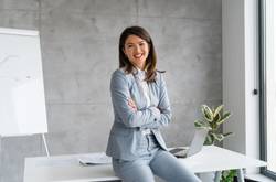 Woman Sitting In Office