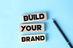 Blue Background With Words "Build Your Brand"