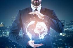 Business Man Holding Globe