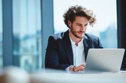 Business Man At Laptop