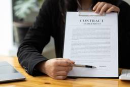 Employment contract agreement document with signature line for UAE fixed-term employment contracts.