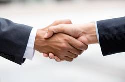 Two Co-Founders Shaking Hands