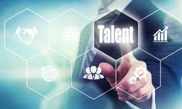 Businessman Pointing To Word "Talent"