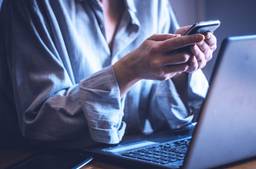 Professional Person Receiving Text Message On Phone