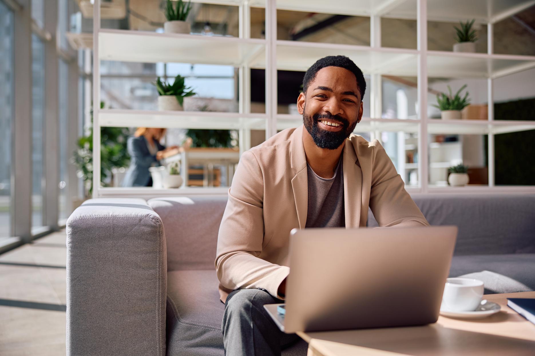 Founder starting an online business in Dubai with a laptop.